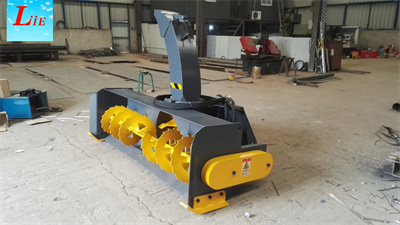 Skid steer snow thrower