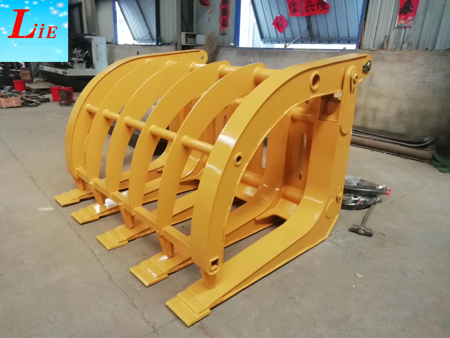 wheel loader log grabber attachments
